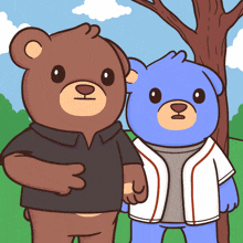 two teddy bears are standing next to each other in a park
