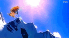 a person standing on top of a snow covered mountain