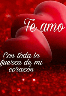 two red hearts with the words te amo on top