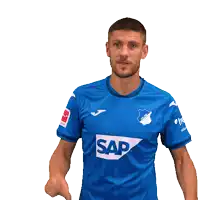a man wearing a blue shirt with the word sap on the front