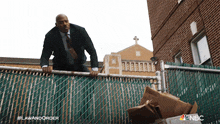 Jumping Over A Fence Detective Jalen Shaw GIF - Jumping Over A Fence Detective Jalen Shaw Law & Order GIFs