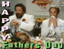 two men are sitting at a table with a turkey and the words happy fathers day