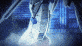 a close up of a robot 's leg with blue lights behind it
