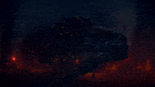 a painting of a monster with glowing eyes