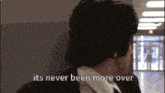 a man in a suit and tie is saying it 's never been more over
