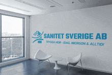 a white wall with the words sanitet sverige ab written on it