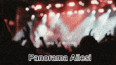 a blurred image of a crowd at a concert with the words panorama ailesi below