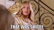 a woman says that was shitty next to a mirror