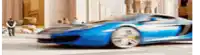 a blue sports car is parked on the side of the road in front of a building .