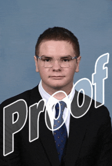 a man in a suit and tie with the word proof written in white
