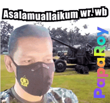 a man wearing a mask with the words " assalamualaikum wr.wb " above him