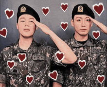 two soldiers salute with hearts surrounding them and one has the letters led on his uniform