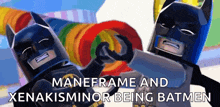 two lego batmen are making a heart shape with their hands and the caption says maneframe and xenakisminor being batmen