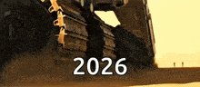 a group of people are standing in the desert next to a large machine that says 2026 .