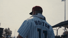 a baseball player wearing a number 17 jersey