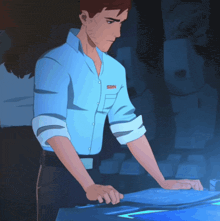 a man in a blue shirt with the word snn on his chest