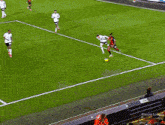 a soccer game is being played in the premier league in 2024/25