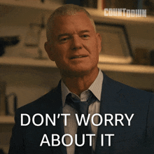 a man in a suit and tie says " don t worry about it "