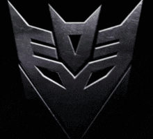 a close up of a transformers logo on a black background