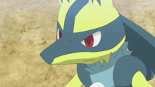 a blue and yellow pokemon with red eyes and a crown on its head