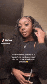 a tiktok video of a girl with long hair