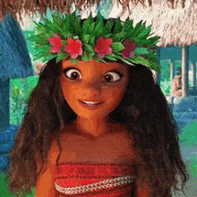 moana from the movie moana is wearing a floral crown on her head .