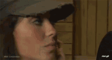 a close up of a man 's face with his eyes closed and his mouth open .
