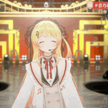 a girl with a microphone on her head smiles in front of a sign that says #