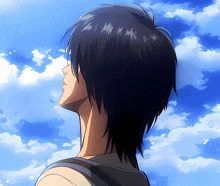 a man with a backpack looks up at the sky