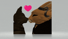 a couple of cats kissing with a heart above them