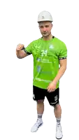 a man wearing a hard hat and a green shirt with the number 24