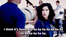 a man and a woman are laughing together and the man says i think it 's funny