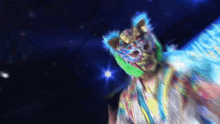 a person wearing a colorful mask with wings and a skull on it