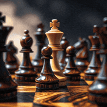 a wooden chess board with a king and a pawn