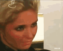a close up of a woman 's face with the words rbd.gif below