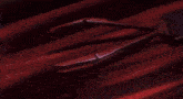 a pink background with a shadow of a sword