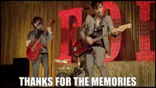 a man playing a guitar on a stage with the words thanks for the memories above him