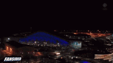 an aerial view of a fireworks display with a fansided logo in the corner