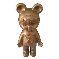 a bronze figurine of a baby bear with a bow on the waist