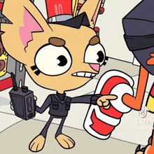a cartoon cat is holding a walkie talkie and pointing at a can .