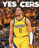 a basketball player wearing a yellow jersey with the number 0