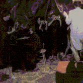 a man in a white coat is standing in front of a group of people playing instruments