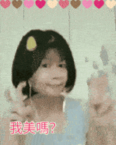 a girl with chinese writing on her face and hearts around her