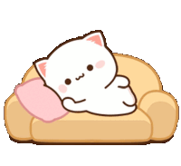 a cartoon cat is sitting on top of a couch with a pink pillow .