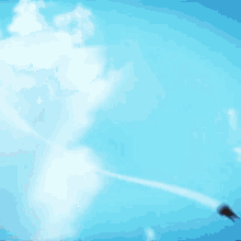 a blurry picture of a man in a superman costume running through the air .