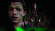 a blurry picture of a man with green and pink lines
