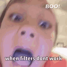 a close up of a person 's face with the words " boo when filters dont work "