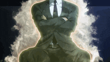 a man in a suit with his arms crossed