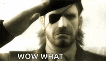 a black and white photo of a man saluting with a beret on his head and the words wow what .