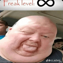 a picture of a fat bald man with the words freak level written above him